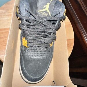 Jordan 4 Black and Gold Athletic Shoes